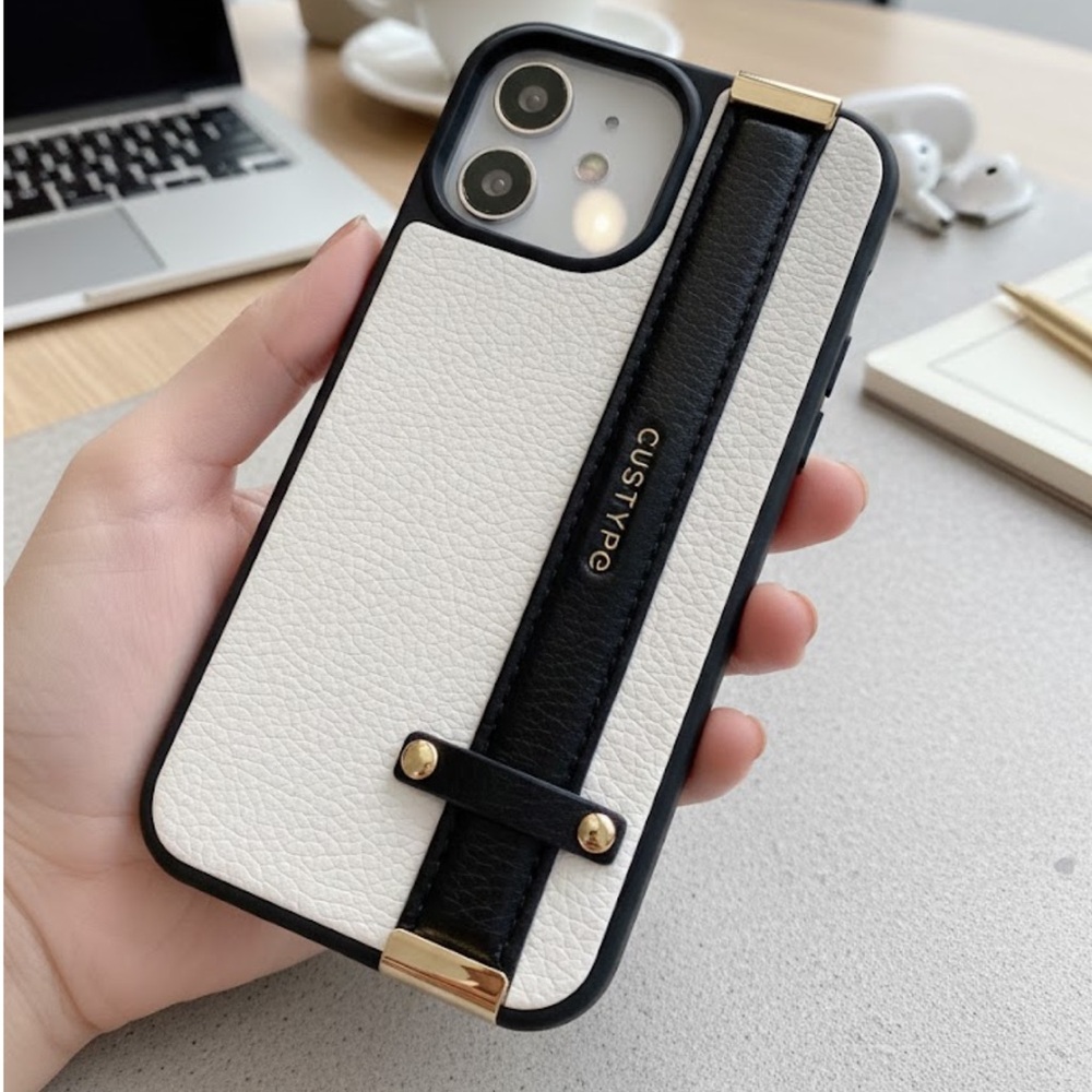 Elegant Black and White Phone Case with Gold Accents